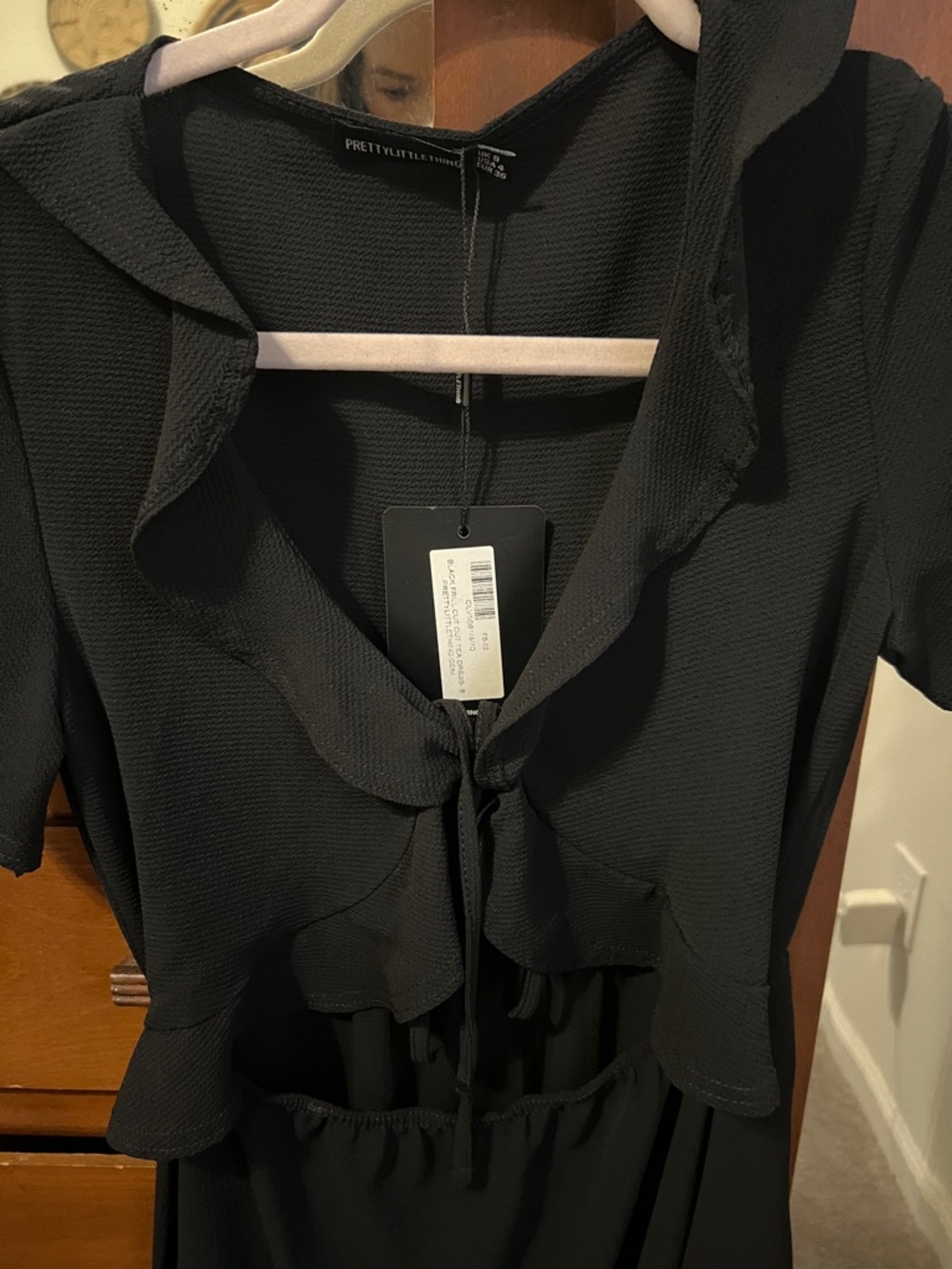 PrettyLittleThing Black Ruffle-Front Mini Dress - Picture 4 of 9